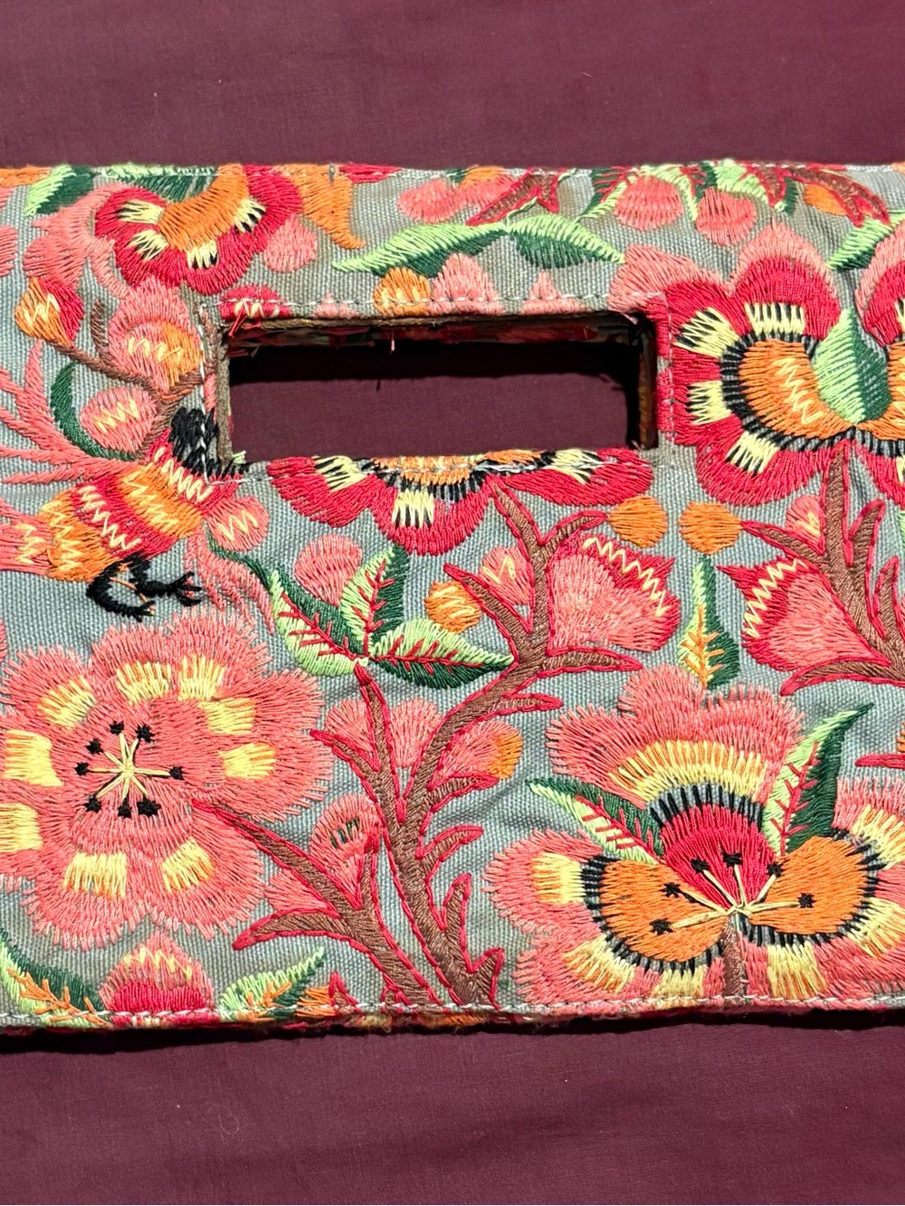 Embroidered Floral Cutout Wristlet Clutch in Coral & Mint